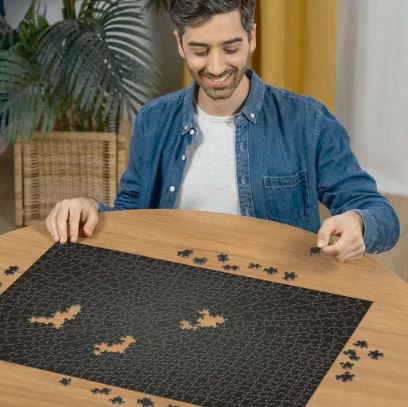 Ravensburger Krypt Puzzle Schwarz, 736 Teile für 12,65€ (statt 15€)