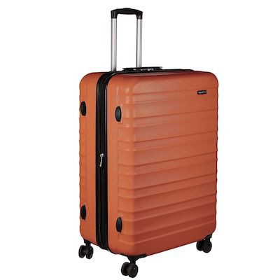 Amazon Basics Hartschalen-Koffer mit 79 cm in Orange für 59€ (statt 85€)