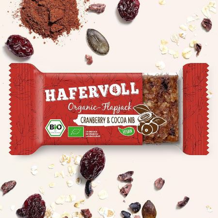 18er Pack Hafervoll Organic Flapjack Cranberry & Cacoa Nib Müsliriegel ab 26€ (statt 36€)