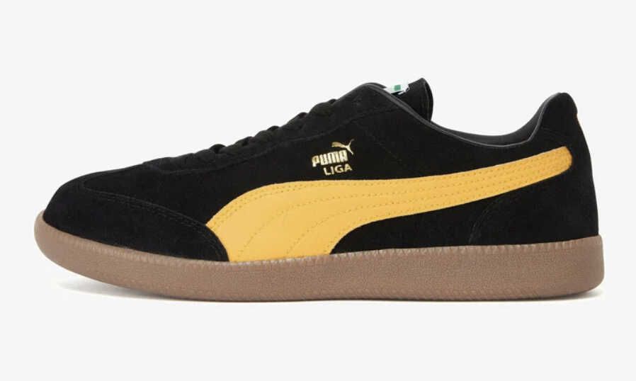 Puma LIGA   Sneaker low   black radiant yellow team gold für 33,95€ statt 49,90€